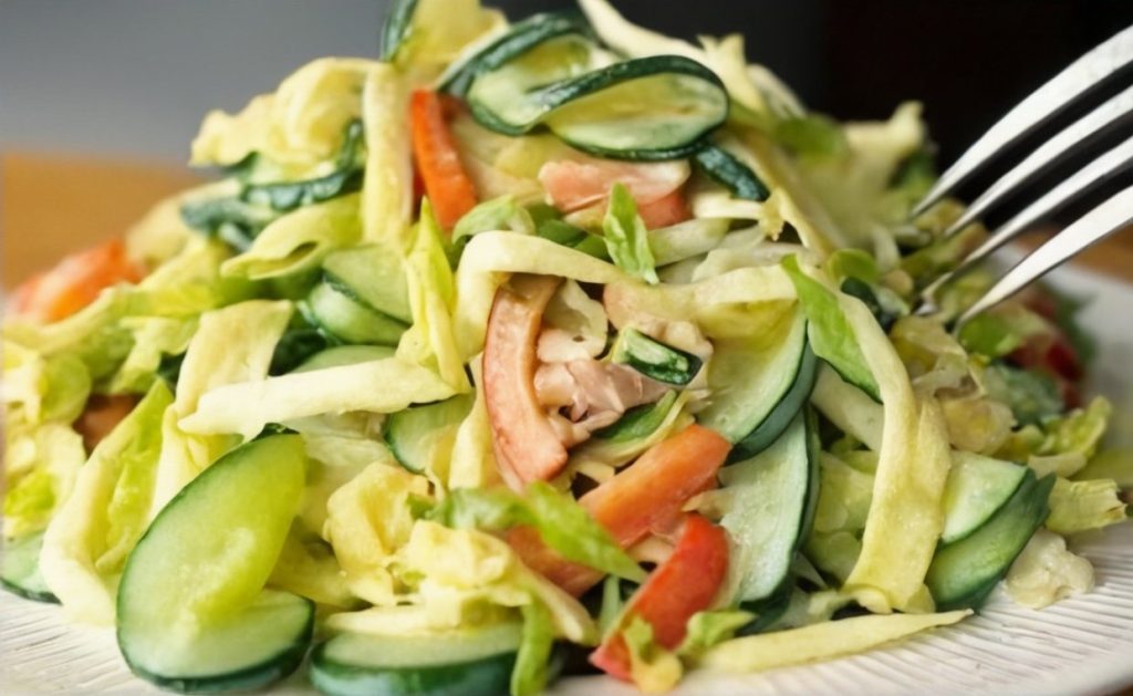 Cucumber salad with cabbage and creamy dressing